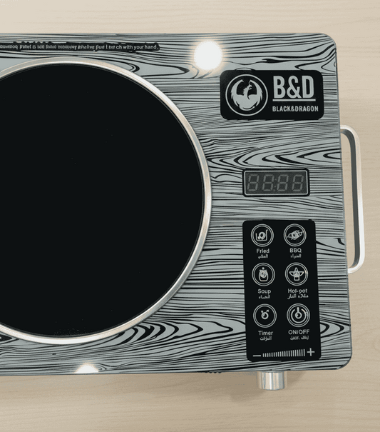 Induction cooktop with B&D Black Dragon branding 