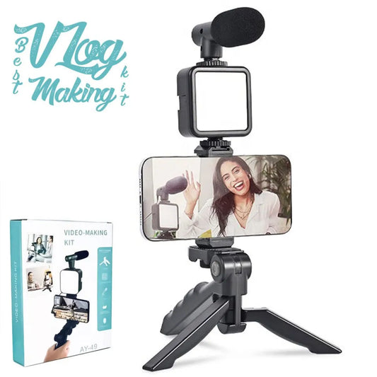 Video-making kit with smartphone holder, microphone, and tripod on a white background